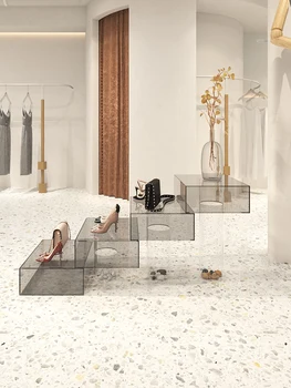 אקריליק חנות בגדים נקאג ' ימה להציג את הנעל בשקית גבוה ונמוך תצוגת מדף יצירתי טרפז מים השולחן